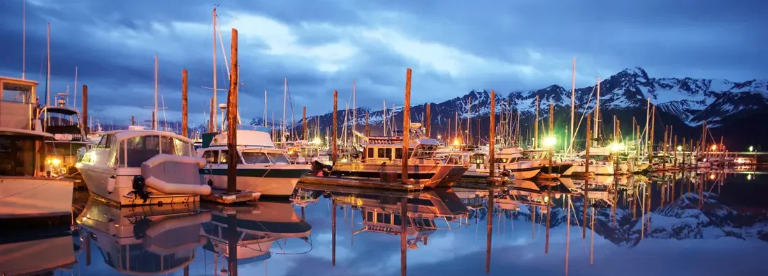 Boats on Smooth Resurrection Bay Seward Alaska Harbor Marina. Find Alaska Boat Insurance.