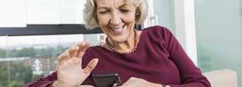 Older Woman on her cell phone