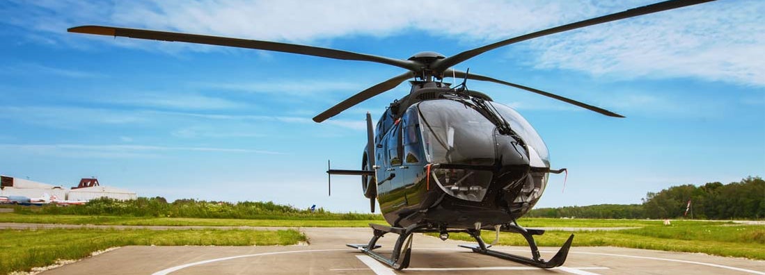Helicopter parked at the helipad. Find Helicopter Insurance.
