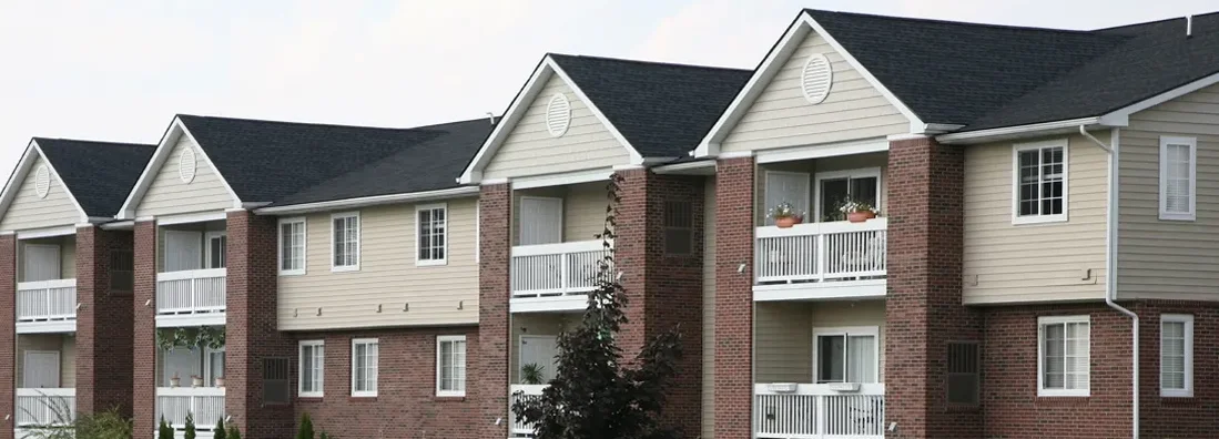 Suburban apartment complex. Find North Dakota condo insurance.