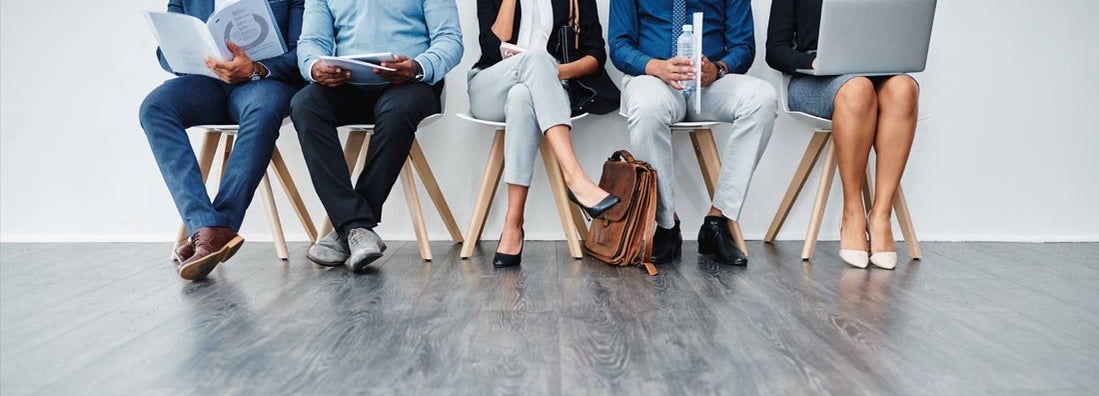 Cropped shot of a group of diverse businesspeople waiting in line for interview