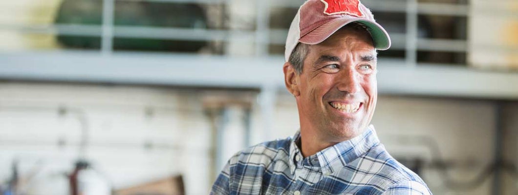 American man standing in a warehouse