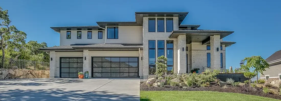 Beautiful exterior and front yard of newly built modern home. How to Find the Best Homeowners Insurance in Eagle, Idaho.