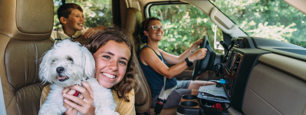 Family on RV Road Trip during summer vacation. Find Texas RV Insurance.
