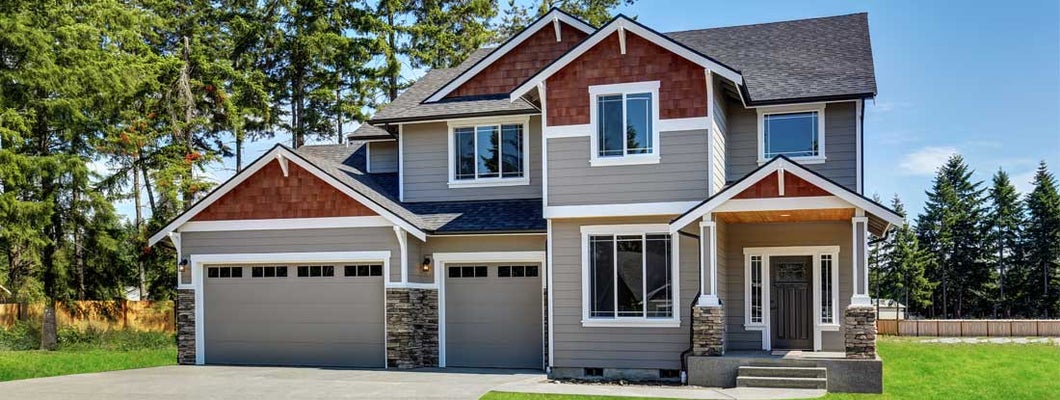 Craftsman American house with garage and concrete floor porch. Find Denver Colorado homeowners insurance.