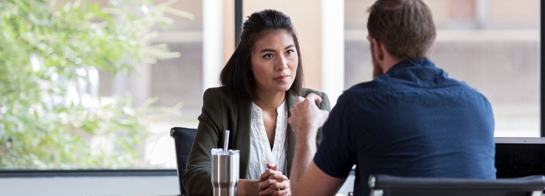 Attentive landlord listens to potential renter. Find Maine landlord insurance.