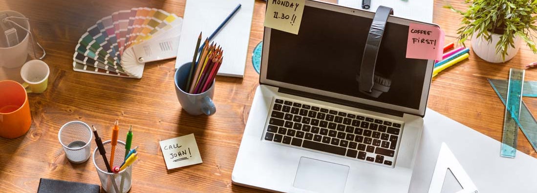 Messy desk of web designer