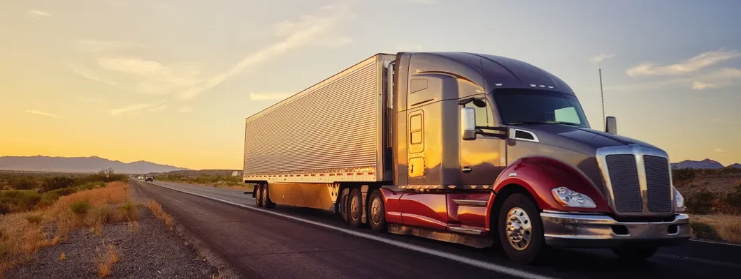 Long Haul Semi Truck On a Rural Western USA Interstate Highway. Find Non-Trucking Liability Insurance.