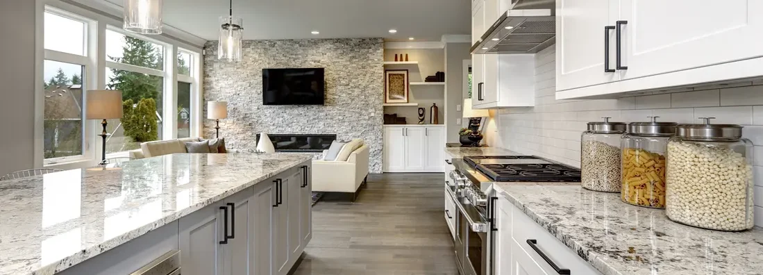 Kitchen in luxury home modern interior with island and stainless steel chairs. Swathmore, Pennsylvania Homeowners Insurance. 