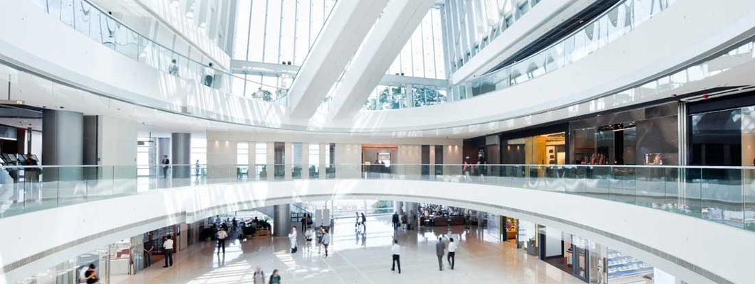 Inside a modern Shopping Mall. Find shopping mall insurance.