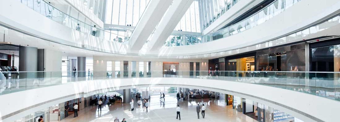 Inside a modern Shopping Mall. Find shopping mall insurance.