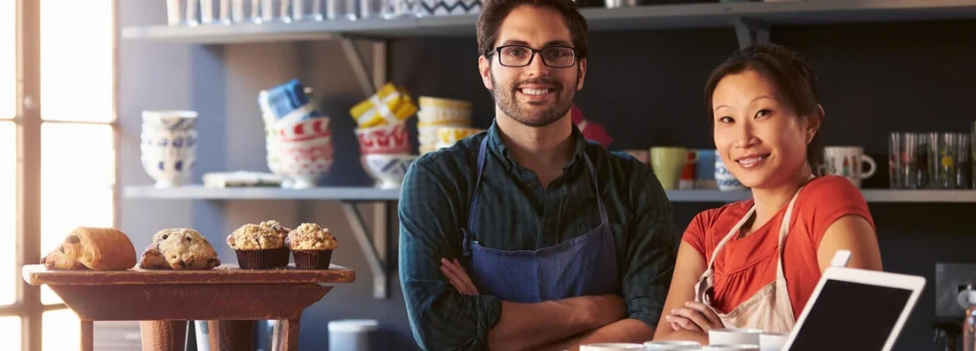 Couple Running Coffee Shop Behind Counter. Find Villanova, Pennsylvania business insurance.