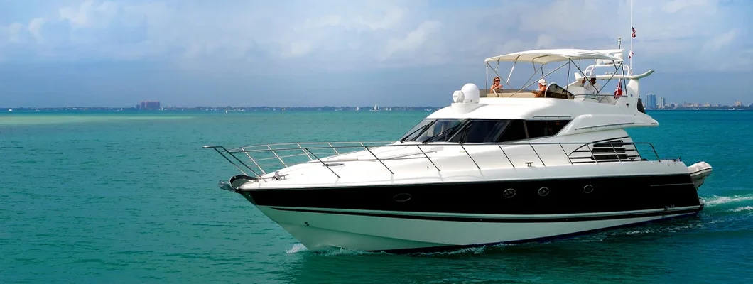 Luxury boat crossing the Biscayne Bay in Miami. Boat Insurance 101.