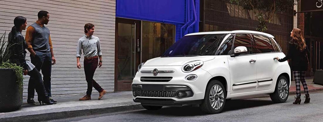 Fiat automobile on street. Find Fiat car insurance.