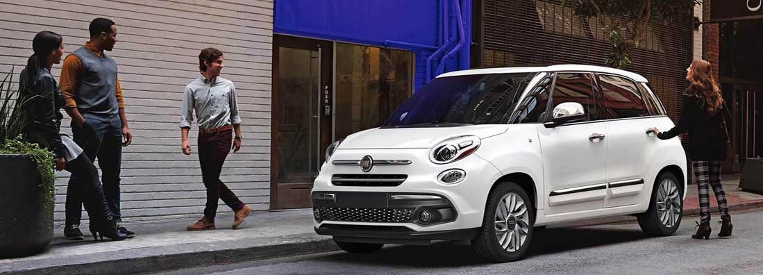 Fiat automobile on street. Find Fiat car insurance.