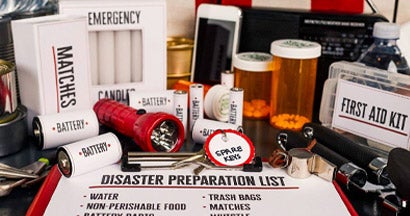Collection of items for disaster preparedness and emergency planning. 6 Must-Know Steps to Prep Your Business for a Natural Disaster.