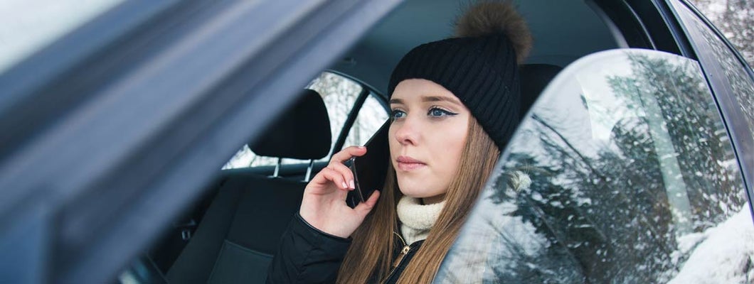 Distracted Driver Texting in Alaska winter