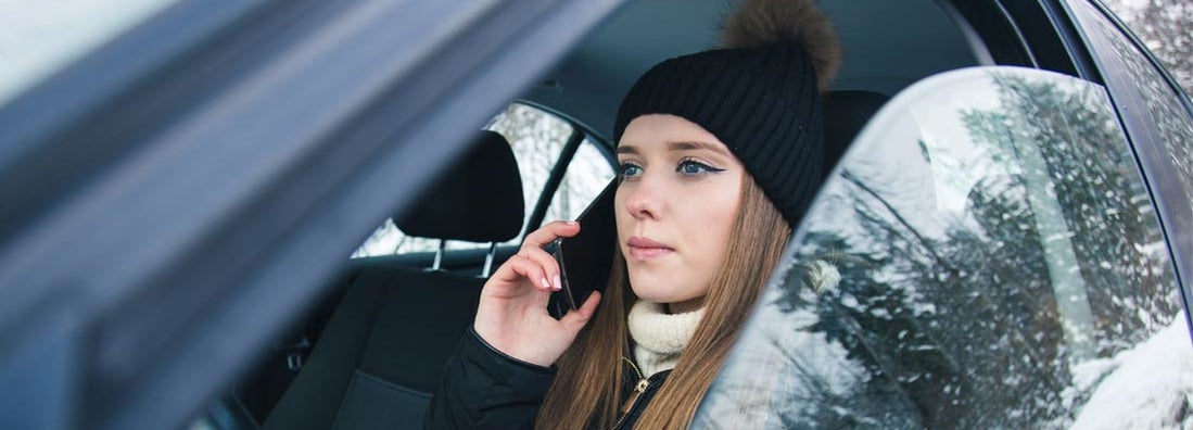 Distracted Driver Texting in Alaska winter