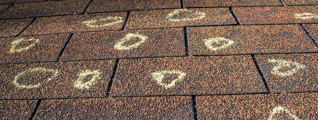 Insurance Adjuster Marked Roof With Hail Damage. Does Home Insurance Always Cover Hail Damage?