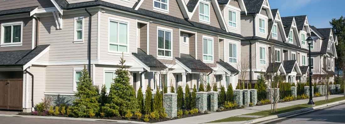 Row of the new townhouses. How to insure a townhouse.