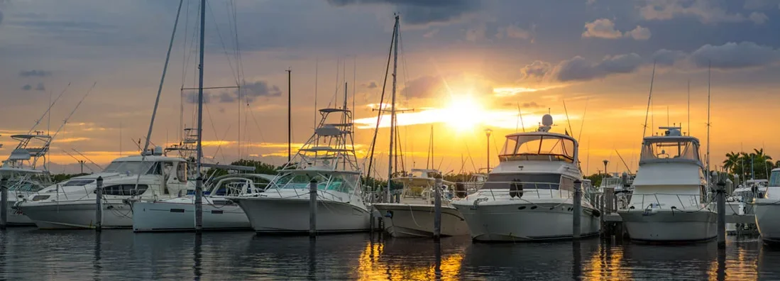 Miami marina at sunset. Find Florida Boat Insurance.