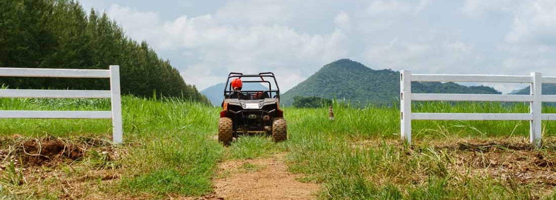 UTV 4-wheel drive in farm. Find UTV Insurance.