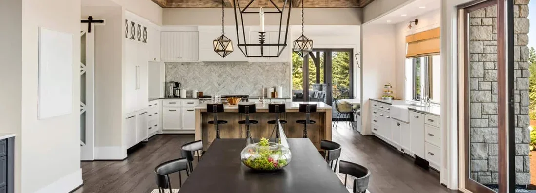 Dining room and kitchen in new luxury home. South Portland, Maine Homeowners Insurance.