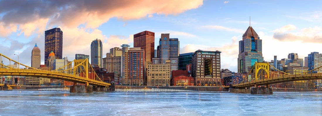 Skyline of downtown Pittsburgh at twilight. Find Pittsburgh, Pennsylvania business insurance.