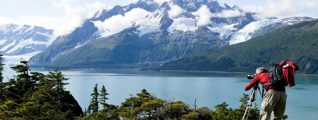 Man photographing in nature, Prince William Sound, Alaska