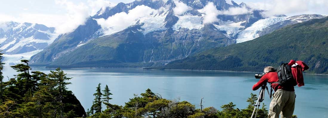 Man photographing in nature, Prince William Sound, Alaska