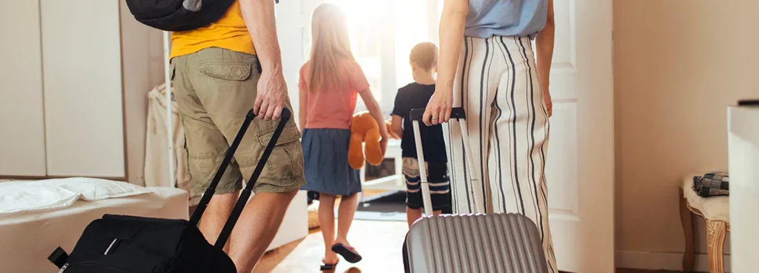 Family leaving their home for a vacation. Vacation Tips before Leaving Town.