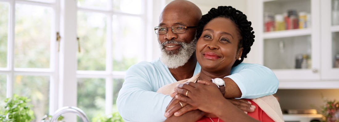 happy mature couple spending time together at home