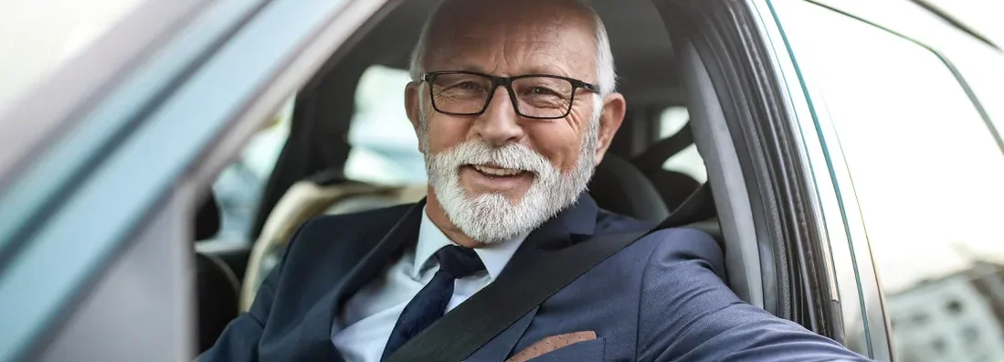 Senior businessman in a car. How to Find the Best Car Insurance Policy in Broadview Heights, OH.