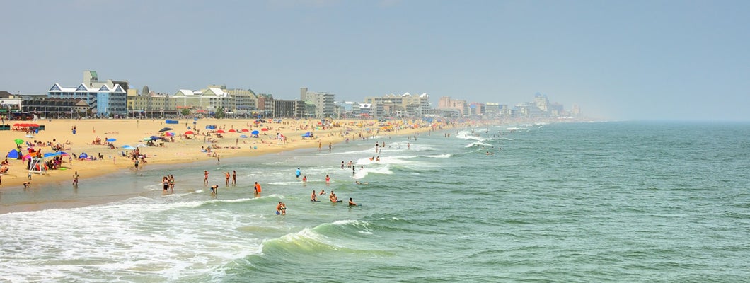 Ocean City, Maryland Skyline And Tourists On Beach