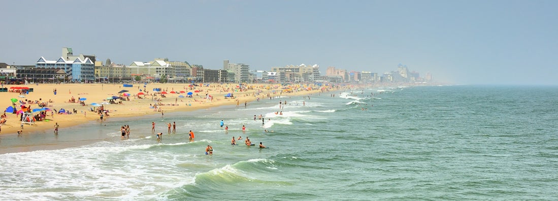 Ocean City, Maryland Skyline And Tourists On Beach
