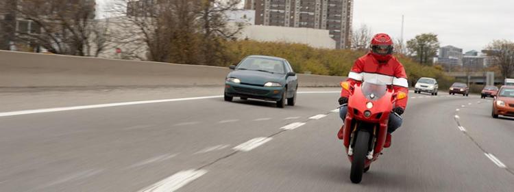 Motorcycle rider on freeway