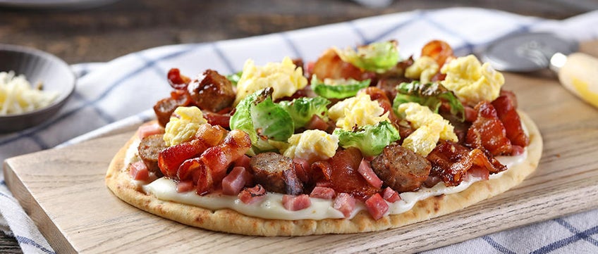 Breakfast Flatbread with Bacon, Sausage, Ham, Eggs and Brussels Sprouts