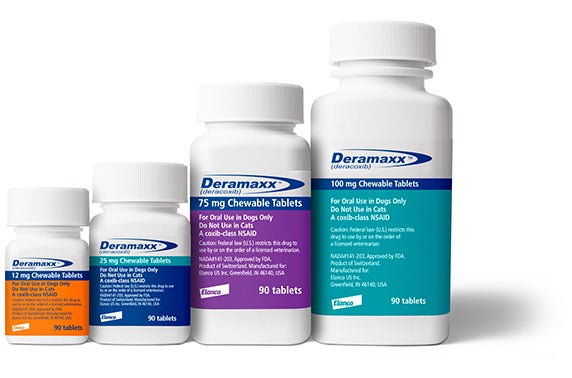 Different sized bottles of Deramaxx lined up next to each other