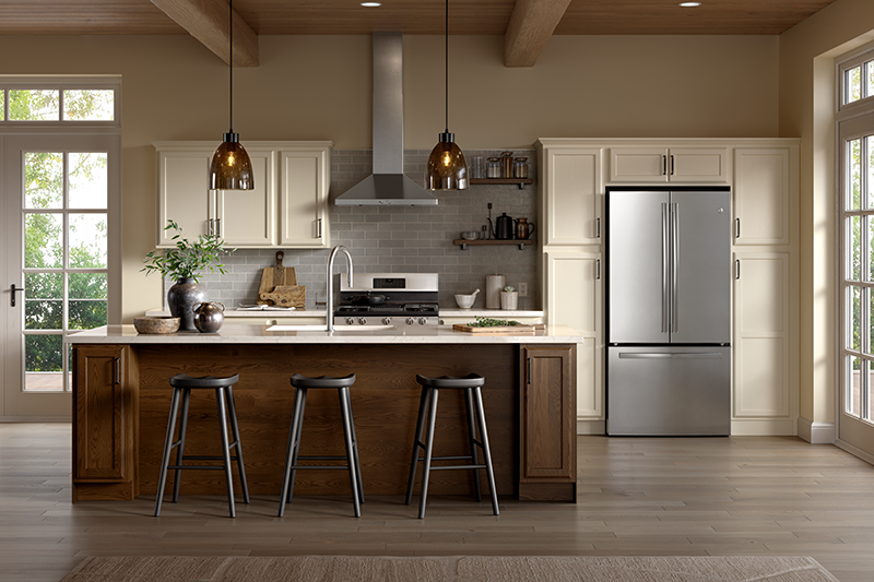 A kitchen with white cabinets and a brown wood stained island.