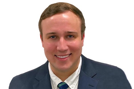 Young man in a blue suite and tie.