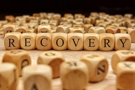 Small letter blocks that spell out "recovery."