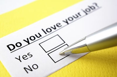 Paper survey that reads do you love your job with a yes and no checkbox. A pen is shown about to mark the "no" box.