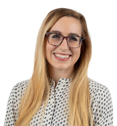 Ashley Wei, PMHNP -BC wearing glasses, blonde hair and a cream blouse.