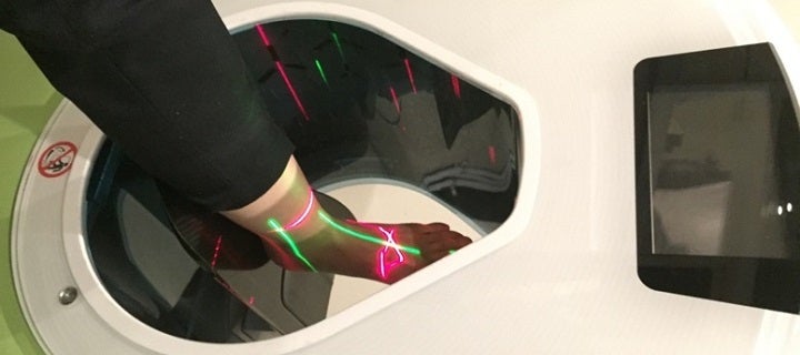 Ankle being scanned by CT in standing position