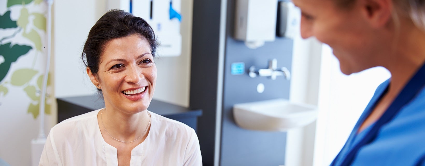 Patient smiling at doctor