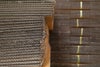 Stacked and bundled corrugated sheets