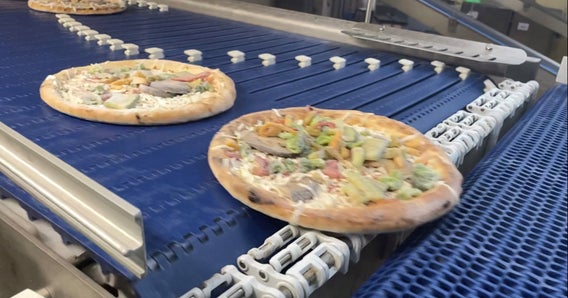 Two frozen pizzas on an AIM XL Switch