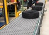 Tires on Intralox Series 4400 Transverse Roller Top (TRT) belting