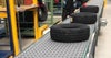 Tires on Intralox Series 4400 Transverse Roller Top (TRT) belting