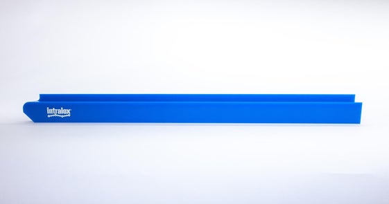 Blue conveyor wearstrips with Intralox logo